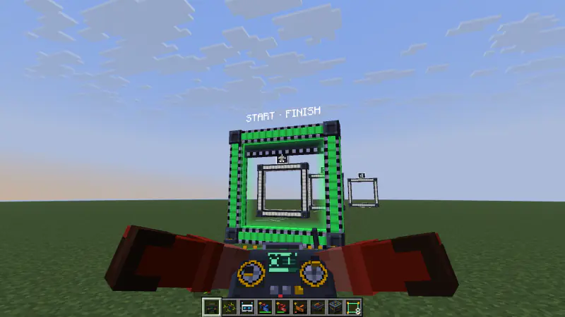 The checkered start/finish gate, lit green as the next gate