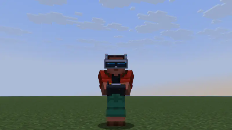 The pilot with goggles on and the radio in both hands