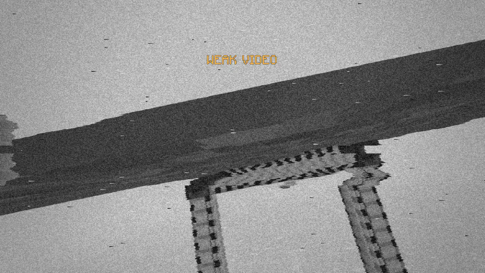 Analog video: heavy snow and sync jumps, the OSD warns WEAK VIDEO